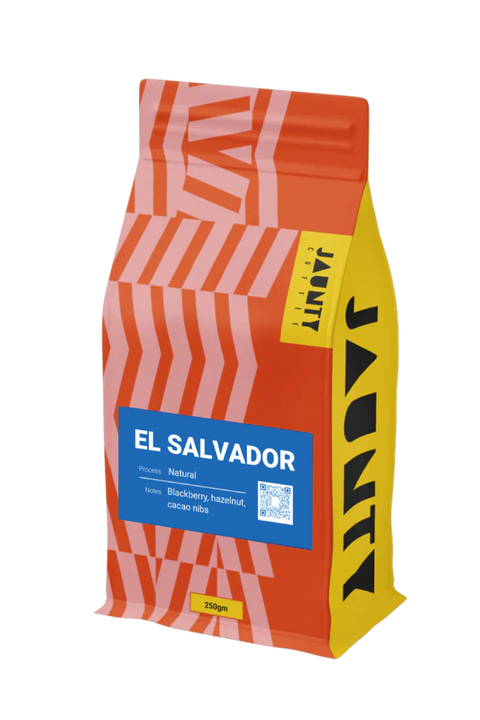 Coffee bag labeled 'El Salvador' with a red and yellow design on a white background, arabica coffee